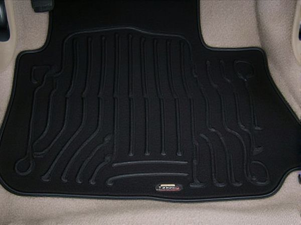 Laser-Measured Floor Mats vs. Trim-to-Fit Floor Mats: What's the Difference?