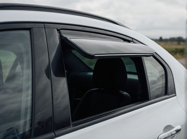 Pop-Out Window vs. Drop-Down Window in Cars: What's the Difference?